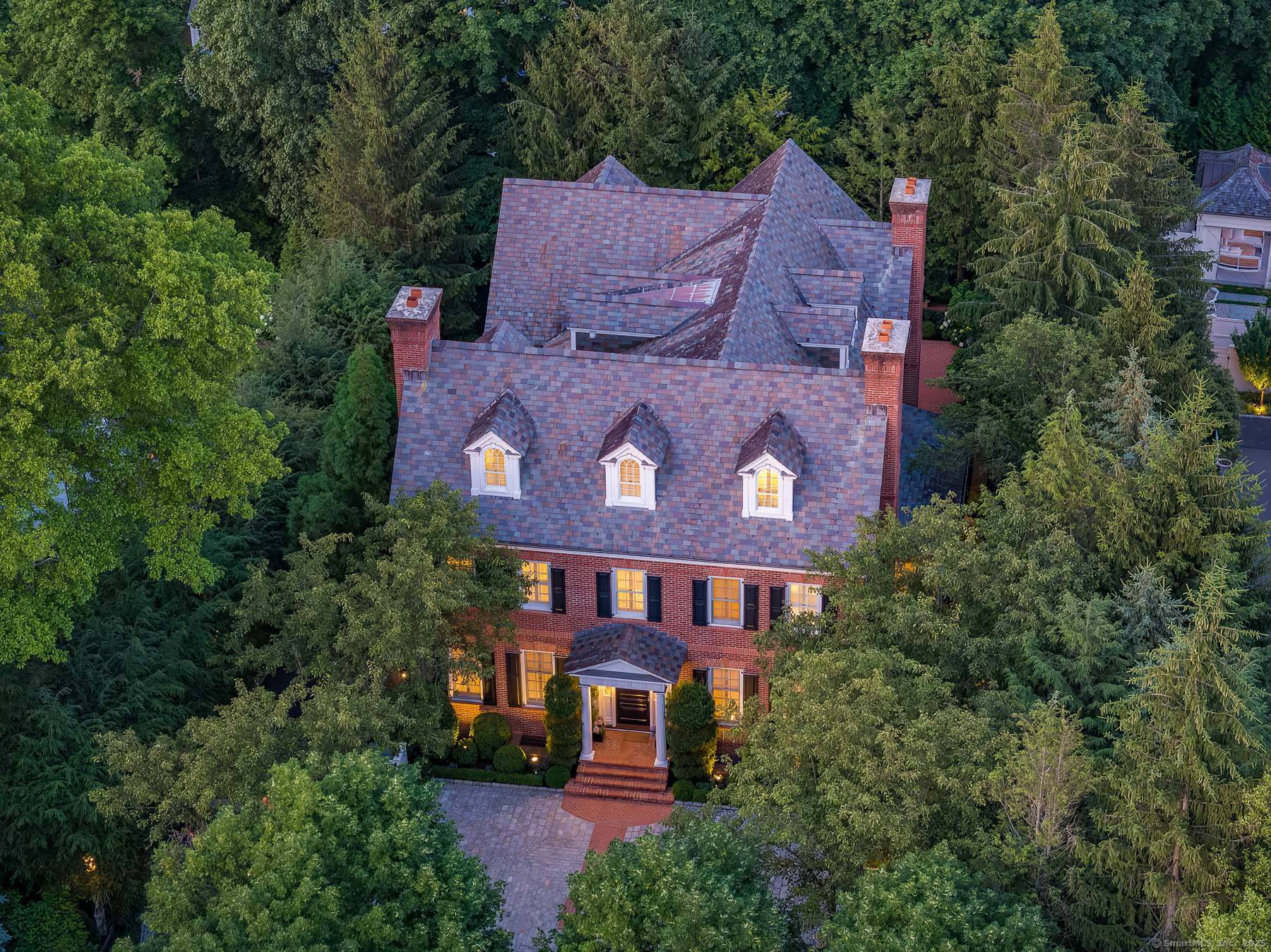 Experience extraordinary living in this sophisticated, estate style majestic brick townhouse with slate roof a truly unique custom built home showcasing timeless elegance impeccable architectural detail across 4 expansive levels.