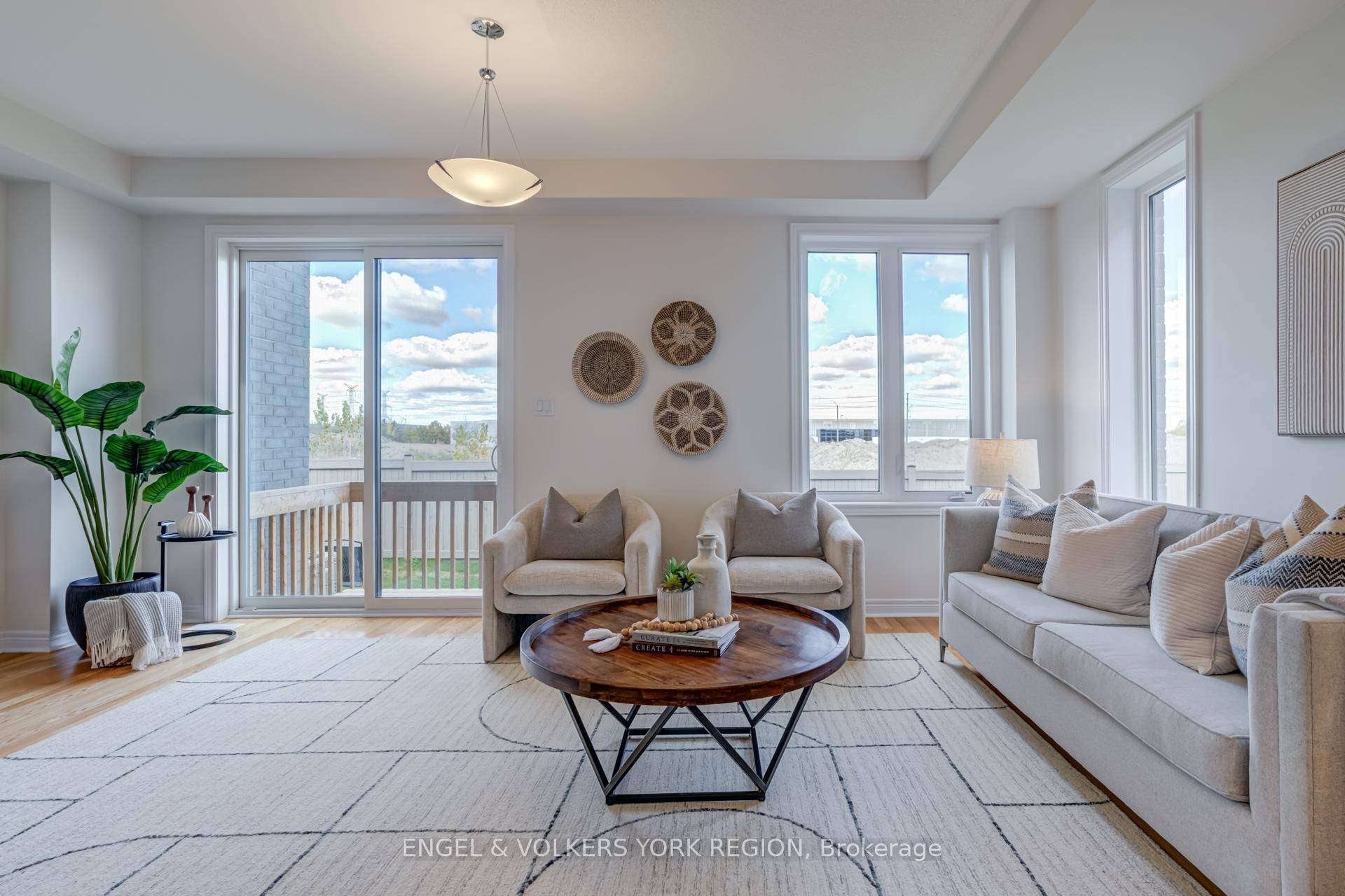 Welcome to this new elegant freehold luxury townhome, crafted by the acclaimed Remington Group.