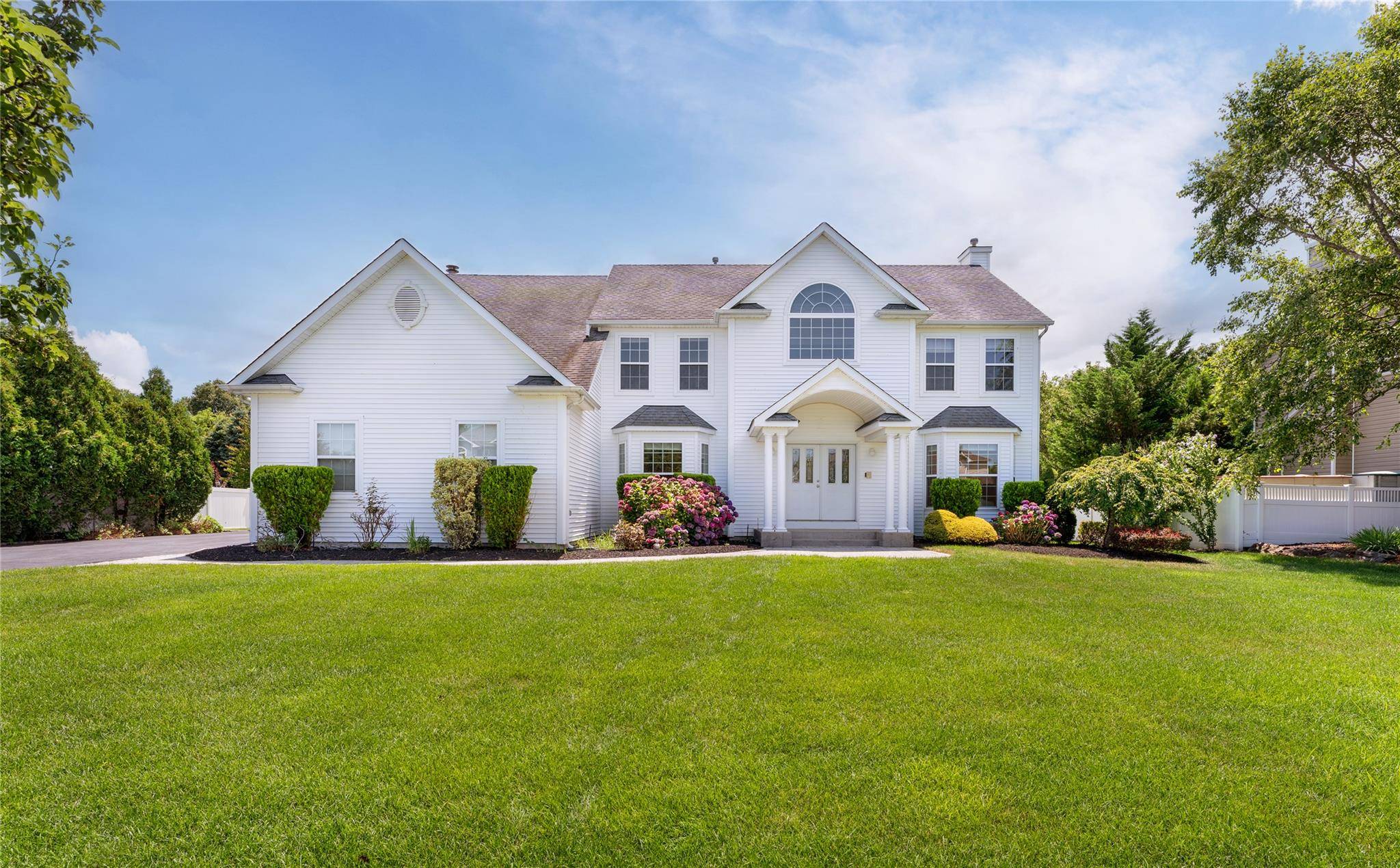 Welcome to this beautifully expanded Oxford II model, nestled in a sought after Island Estates development and built in 2005.