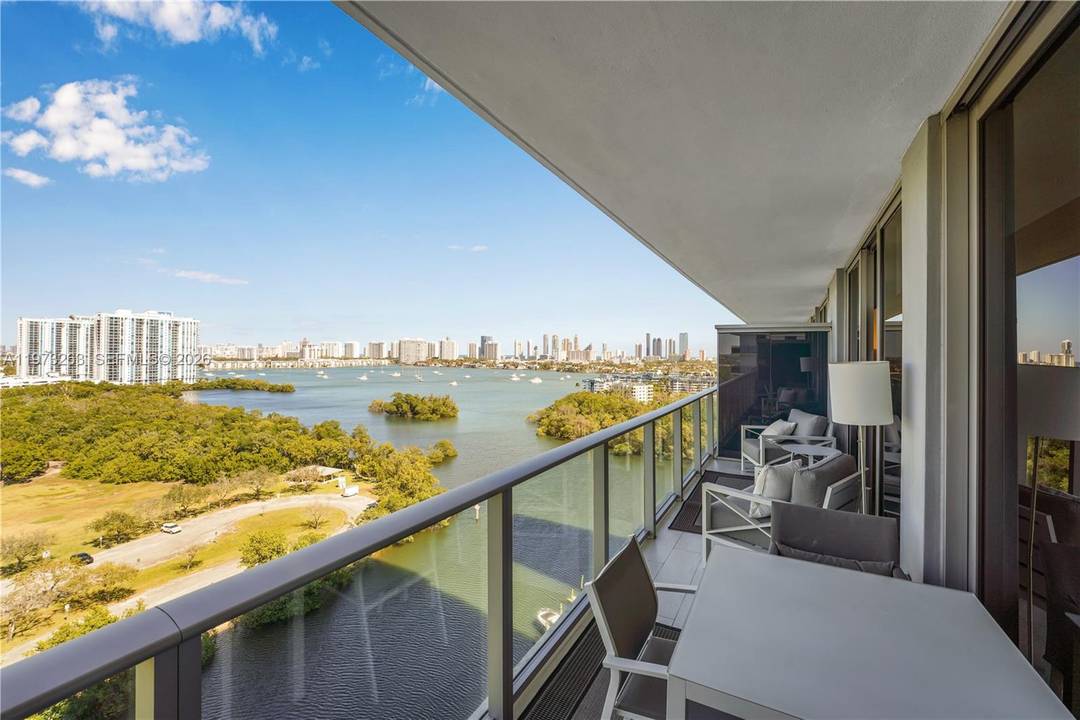 Wake up to direct water views of Oleta River Park amp ; Biscayne Bay from this stunning residence at The Harbour.