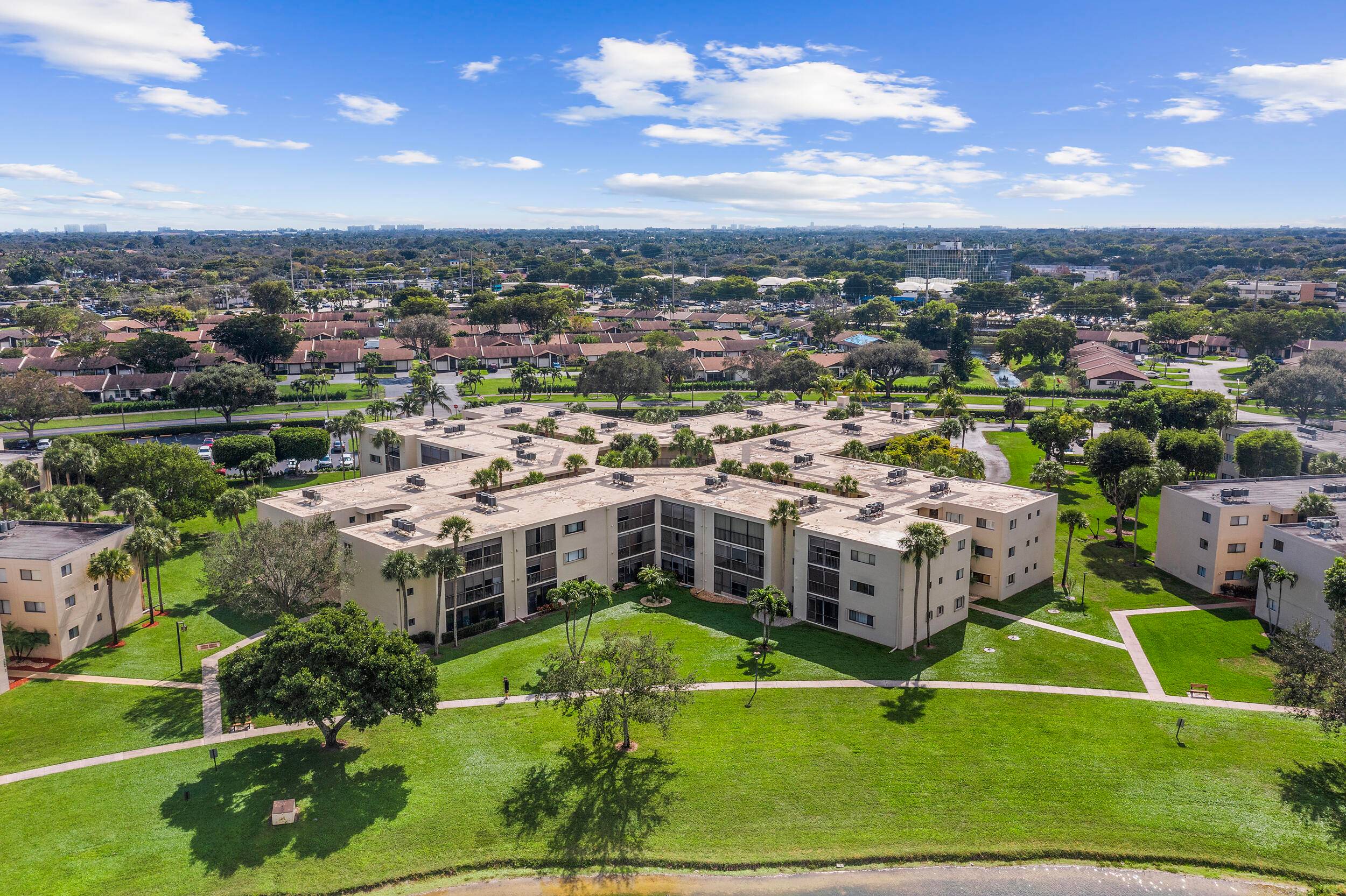 Welcome to this beautifully maintained garden apartment with elevator nestled in the highly sought after 55 community of Las Verdes.