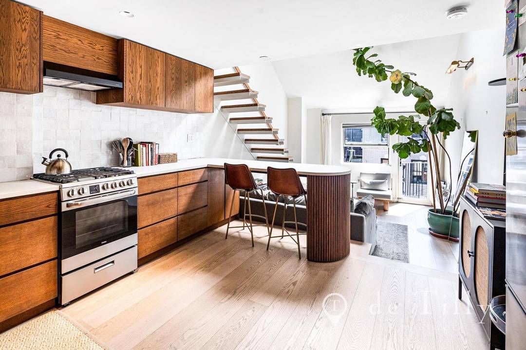 Welcome to Apartment PH6E, a stunningly renovated and sun drenched residence perched on the top floor of a premier elevator co op.