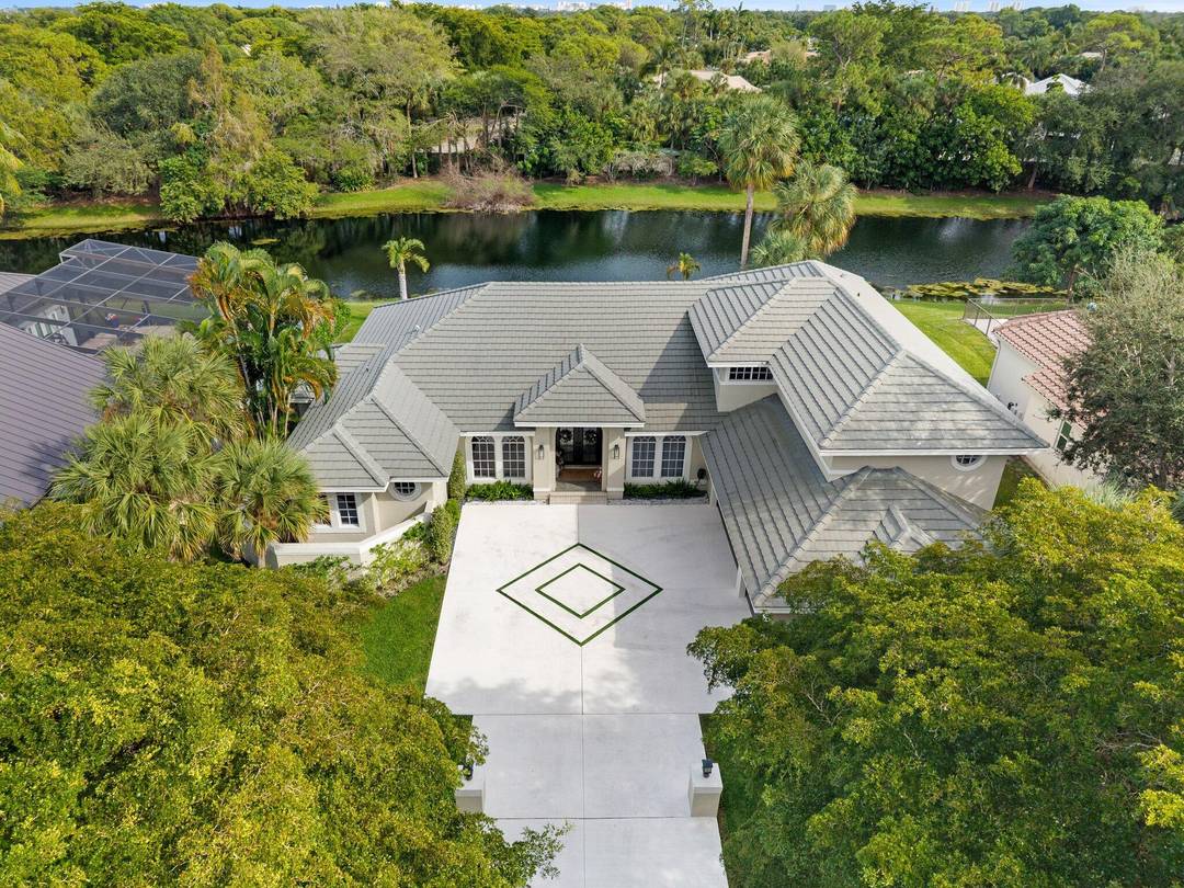 Welcome to a once in a lifetime opportunity in one of Boca Raton's most coveted gated enclaves where homes are rarely available, and right now, this is the only one.