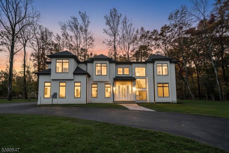 Unveil River Vale ? s most coveted estate, where modern design and natural tranquility come together.