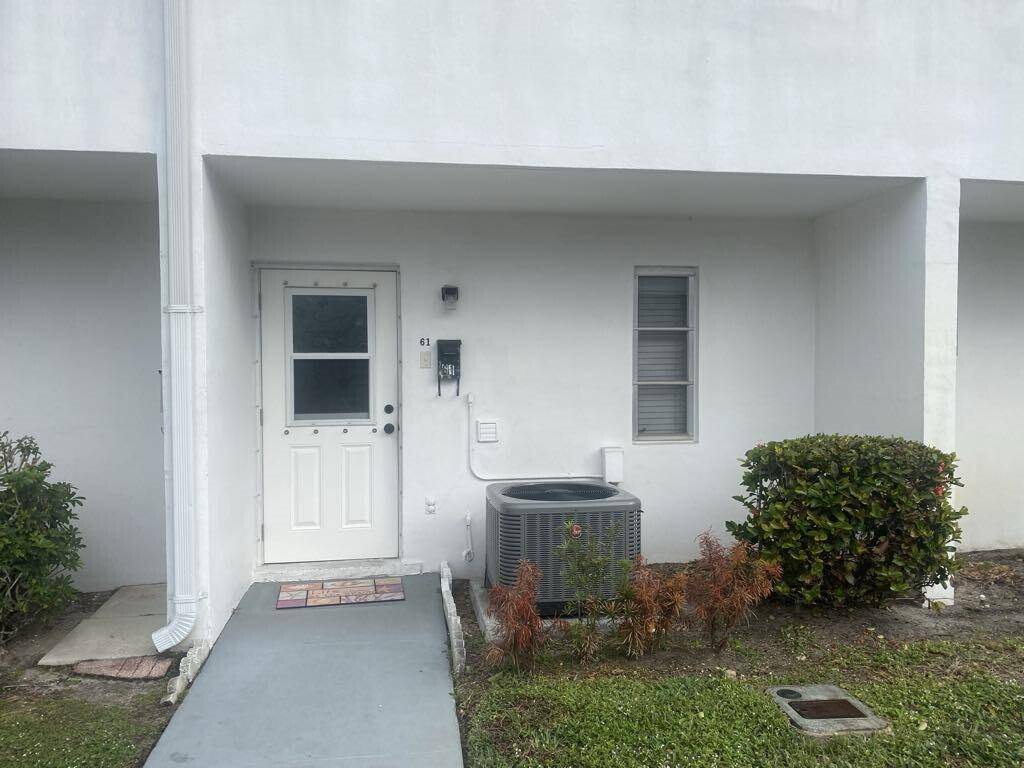 Welcome to your all ages cozy 1 bedroom, 1 bathroom oasis at 61 East Ct in Royal Palm Beach, FL !