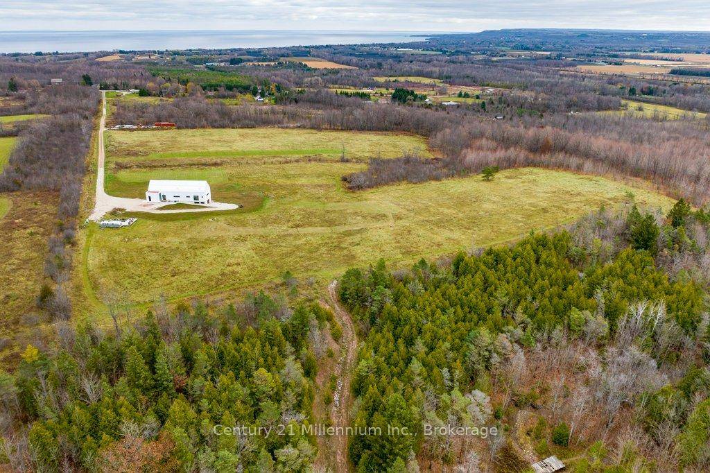 Truly Stunning Contemporary Retreat with Panoramic Views of Georgian Bay, Forest and Escarpment.