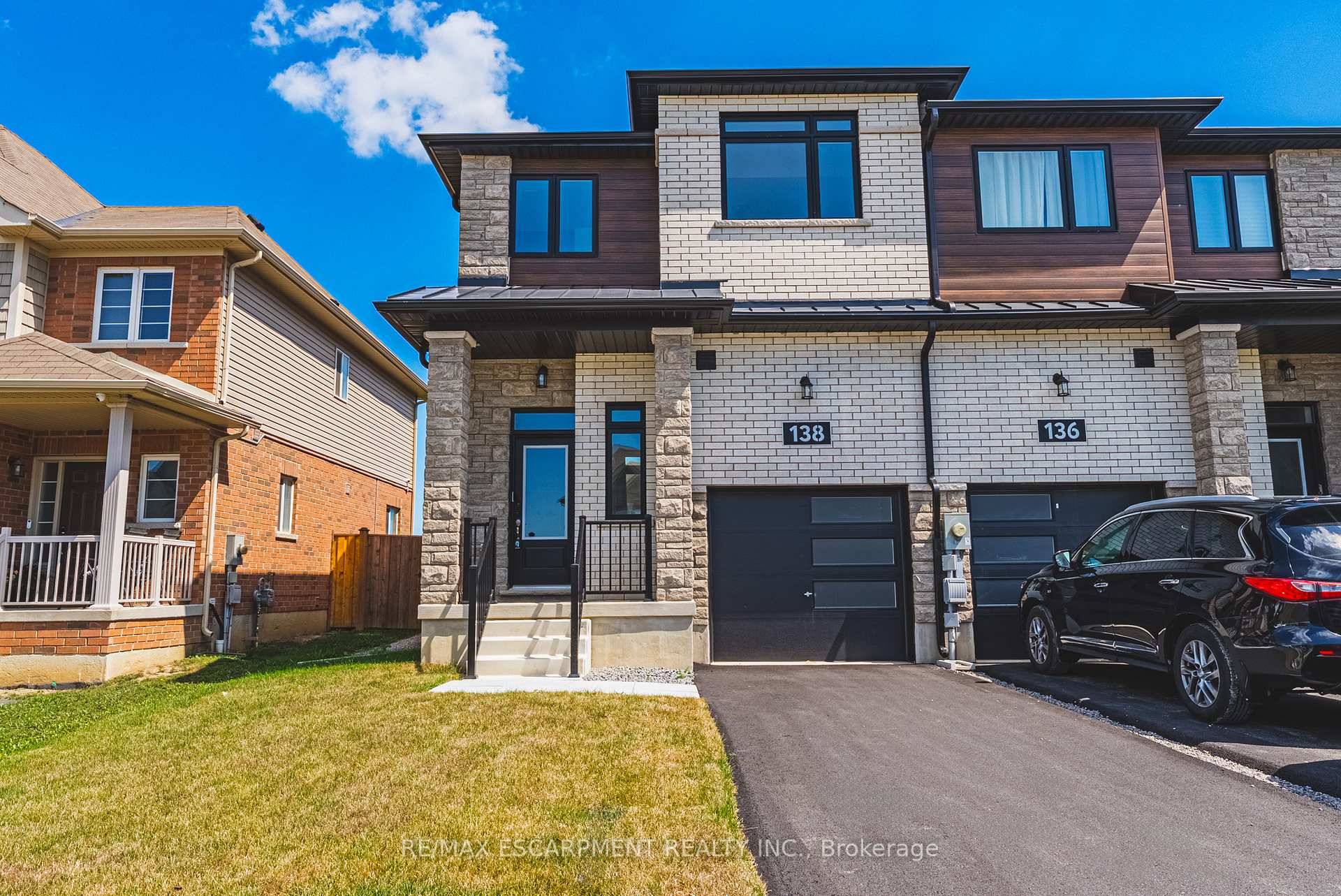 This modern end unit townhome offers nearly 1, 800 sqft of stylish living across three finished levels.