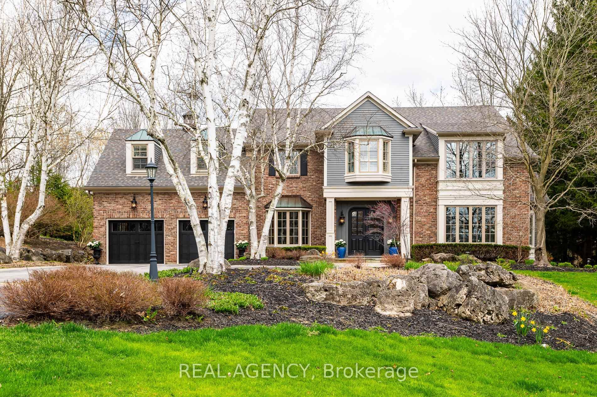 Gated Luxury Estate in Burlington Private, Secure, Minutes from Downtown, Welcome to a spectacular custom built Branthaven estate set on 1.