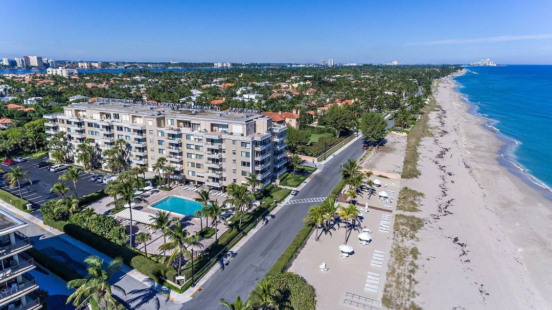 Off season Palm Beach furnished 2 bedroom rental in ideal location with private deeded beach, pool and rooftop terrace with captivating ocean views.