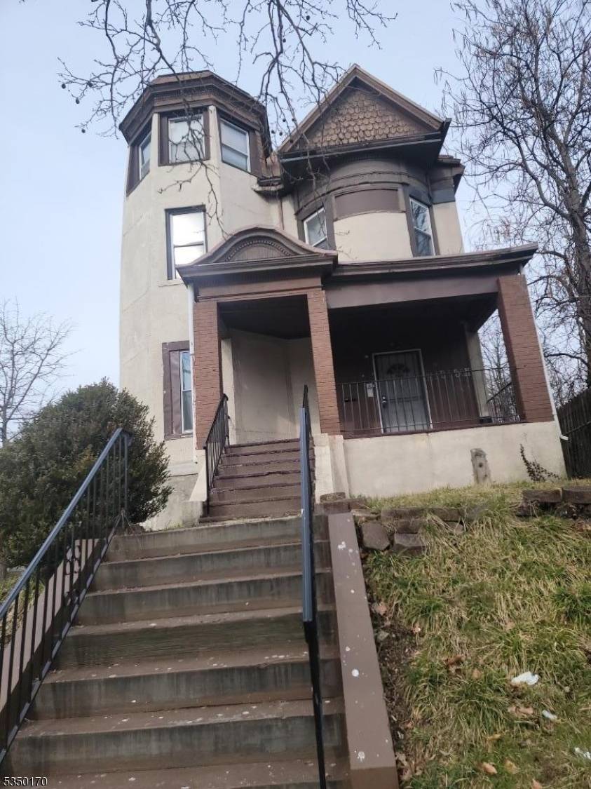 This historic, huge, corner building is approved for 3 fam dwelling !