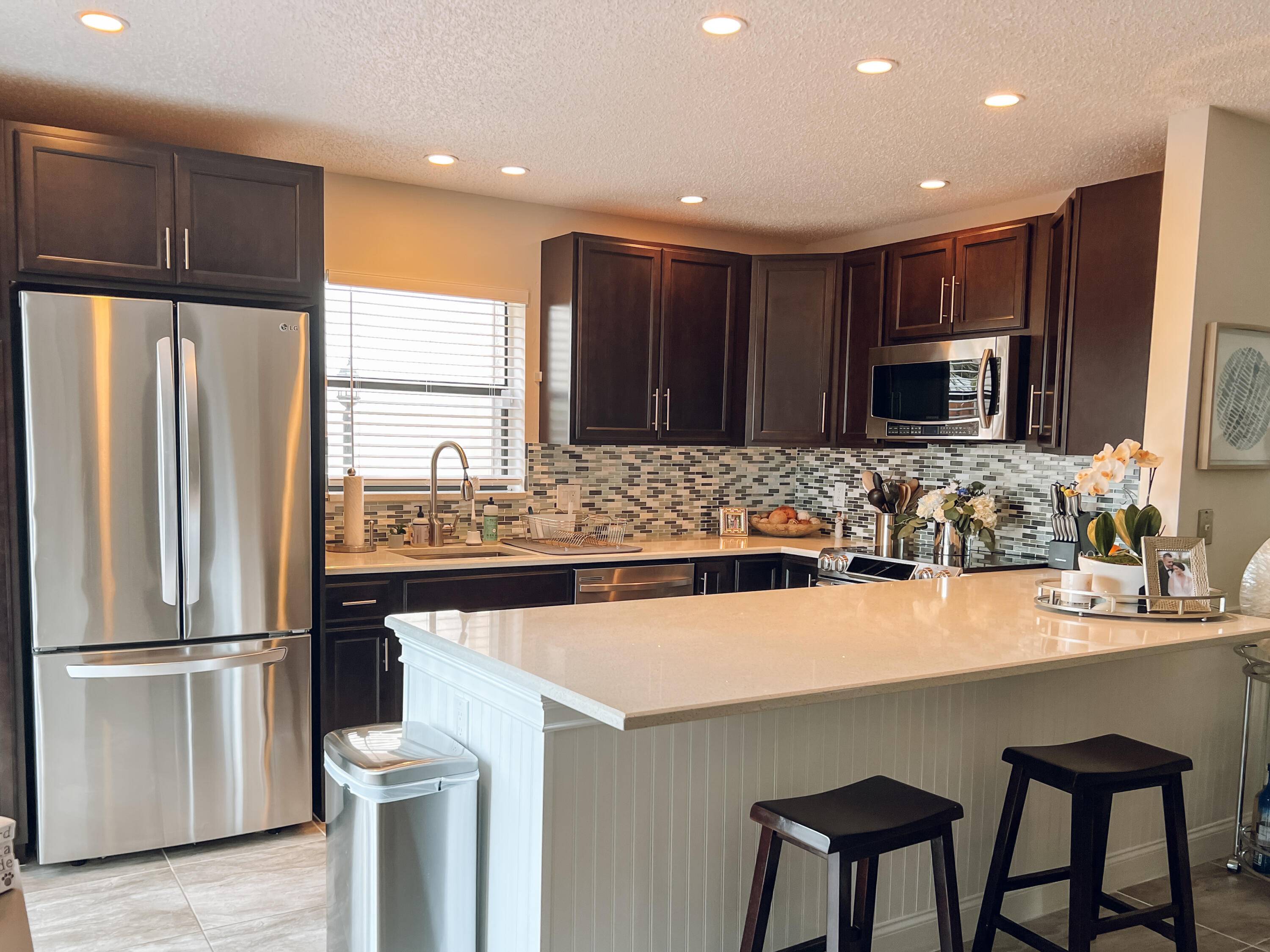 Nestled in one of the most sought after areas in Boca Raton, this impeccably renovated 2 story townhome offers the ultimate in modern living and convenience.
