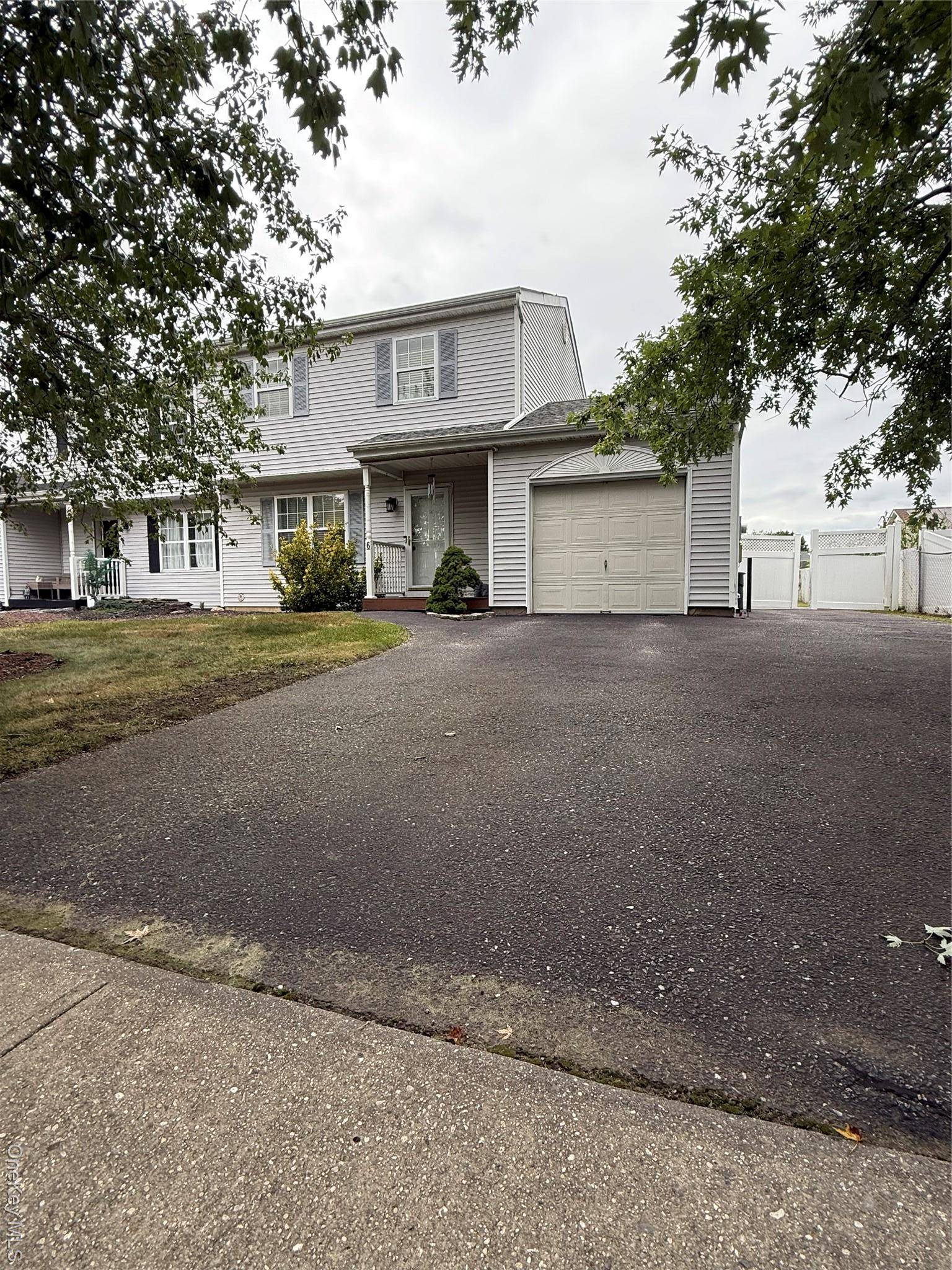 Welcome to 6 Walnut Street, a beautifully maintained home offering comfort and convenience in the heart of Central Islip.