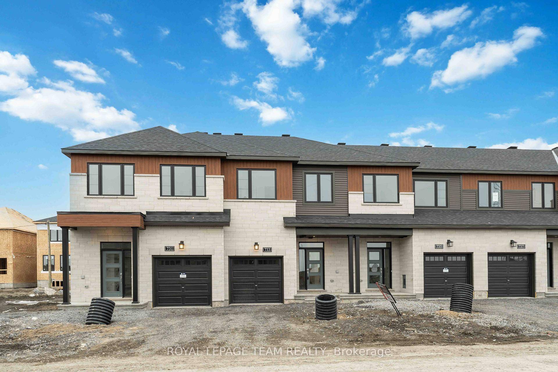 Theres more room for family in the Lawrence Executive Townhome.