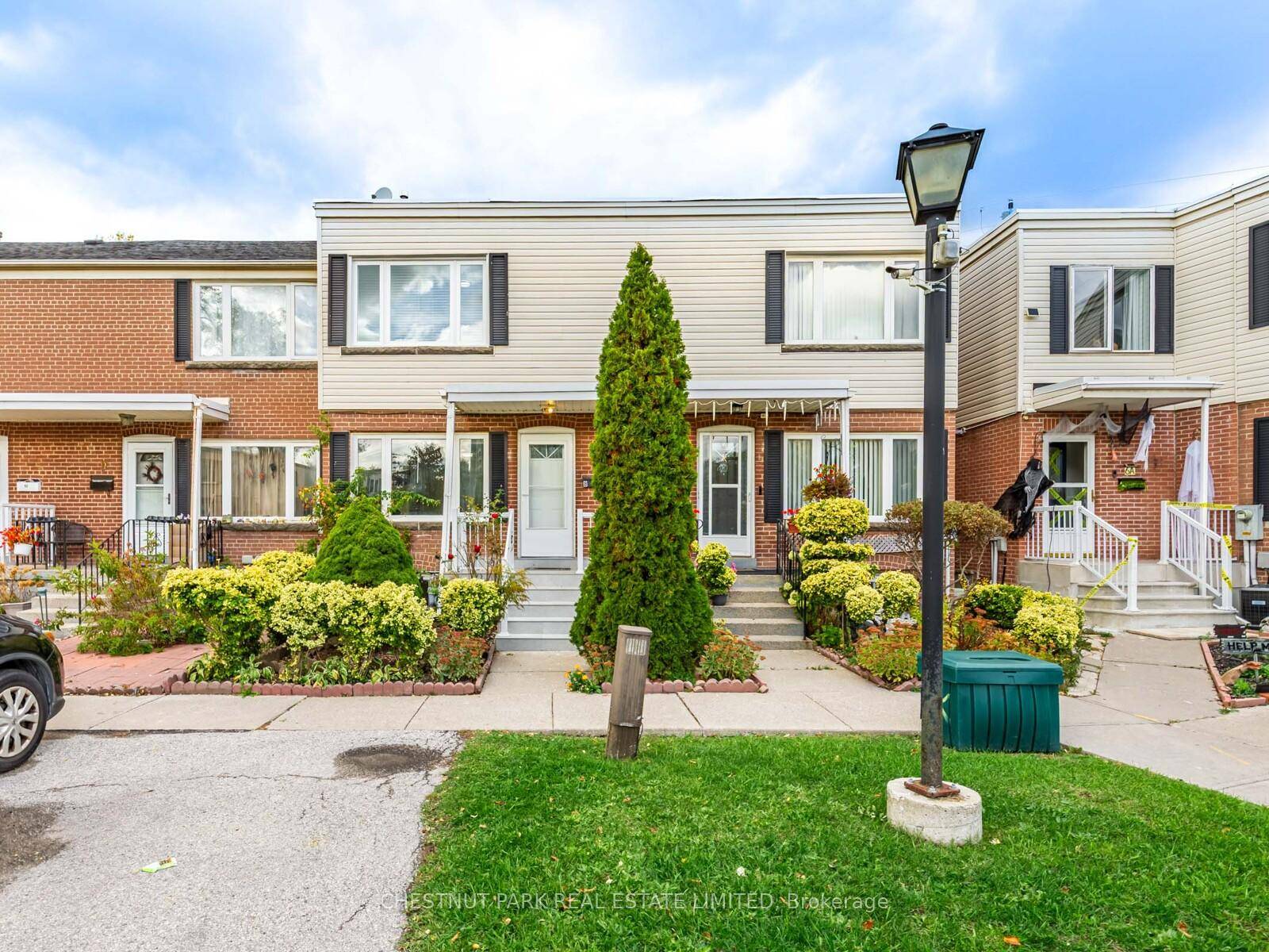 Walk up the steps, past the Summer Blooming Roses into this Spacious 2 1 bedroom Townhouse.