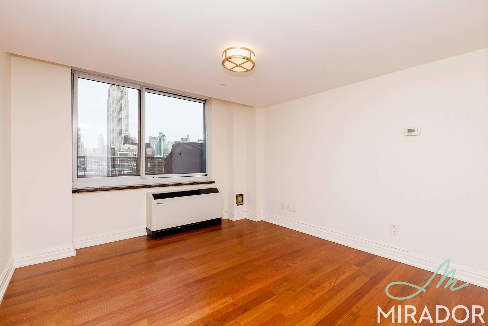 The 3 bedroom, 2. 5 bathroom penthouse featuresmassive private terrace which wraps around the entire apartment and has three exposures.