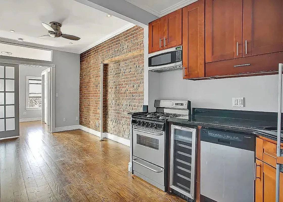 Renovated 2 bedroom apartment features, washer amp ; dryer, and granite kitchen with dishwasher.