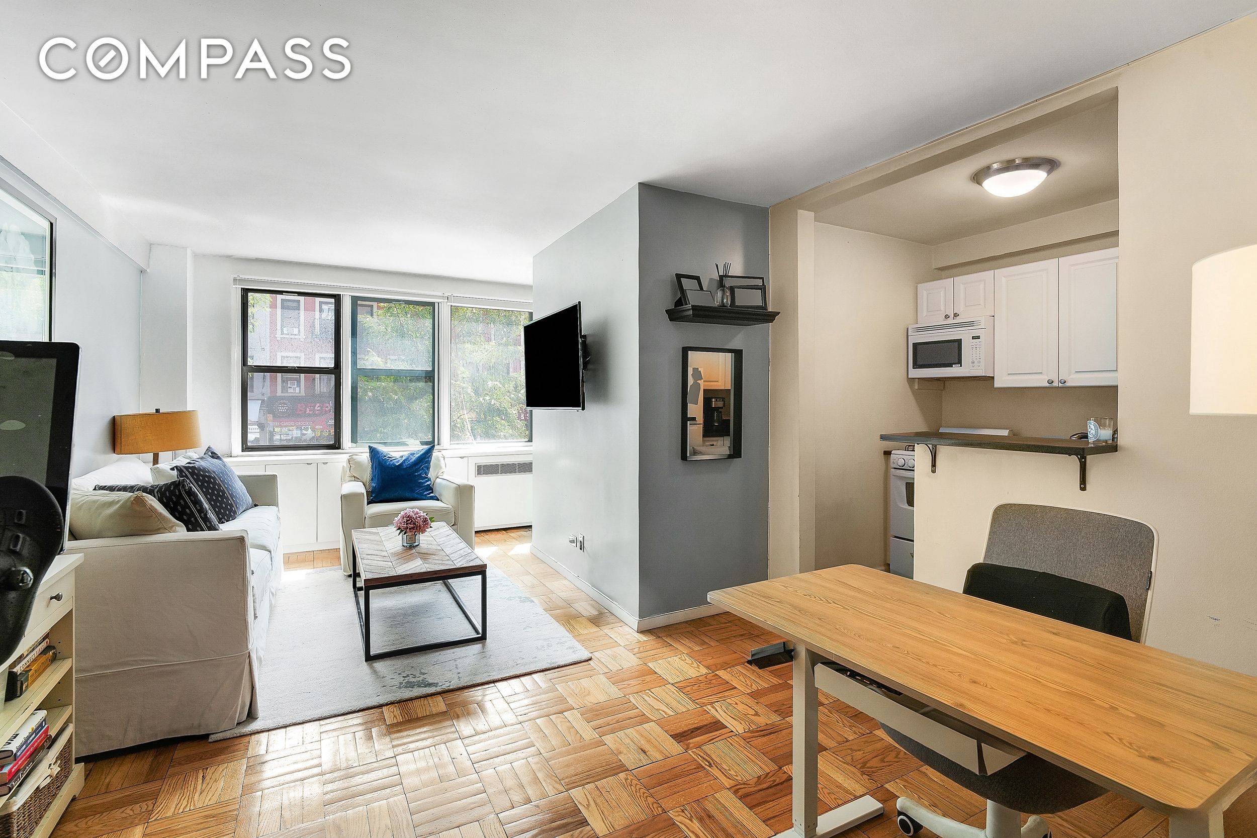 Bright Jr. One Bedroom Flooded with natural light, this cheerful converted alcove studio to a Jr.