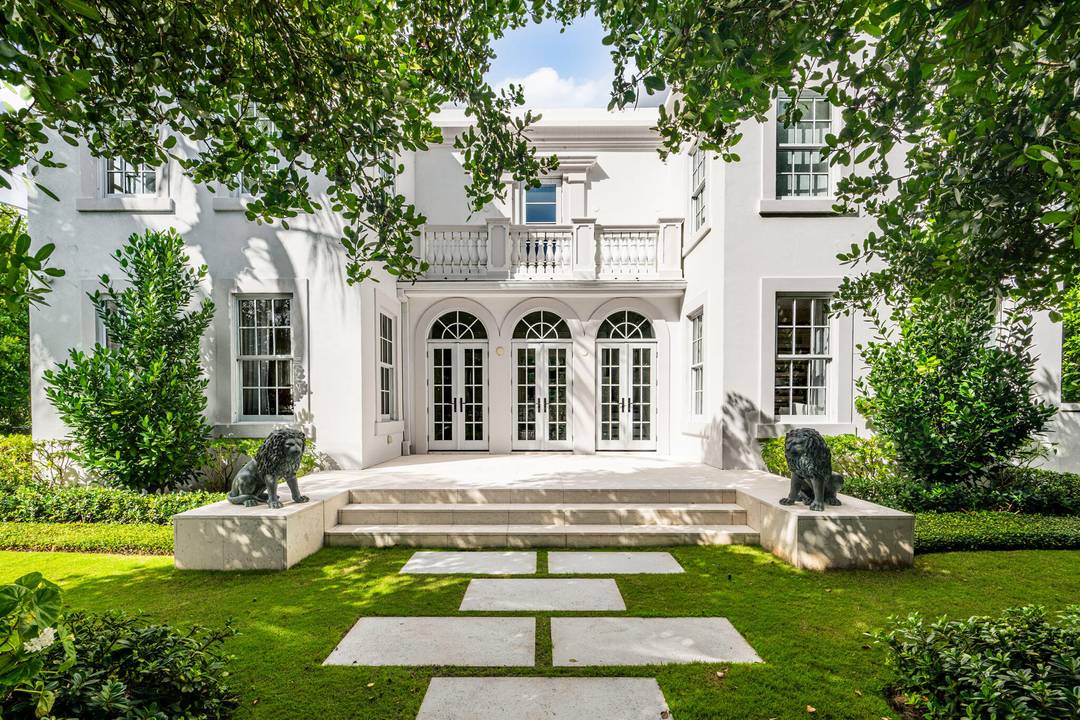 Exquisitely restored and designer furnished 5 bedroom home in the heart of town, only one block from the beach.