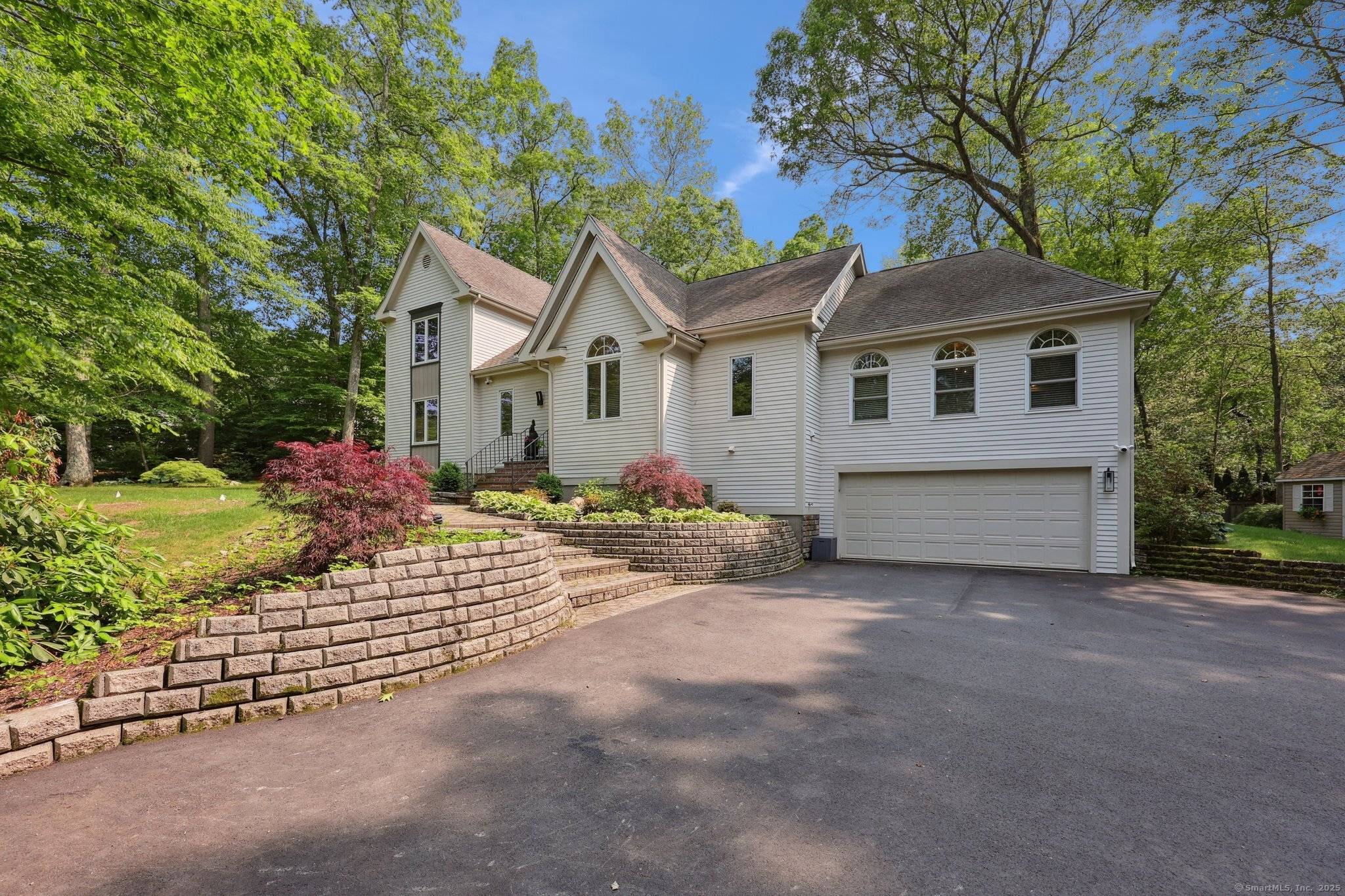 One of a kind home in a small, sought after subdivision close to the heart of charming Madison, CT.
