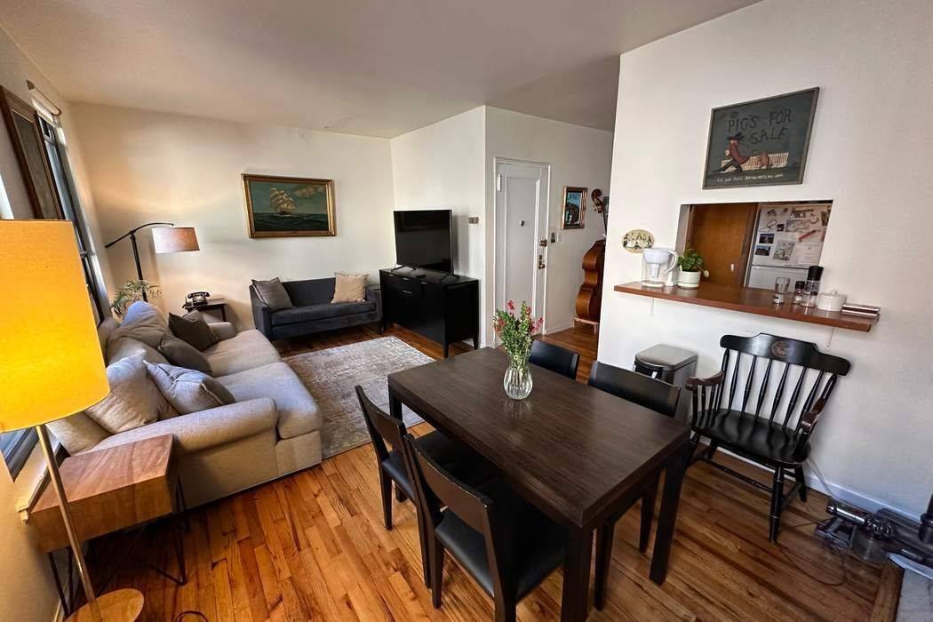 Chelsea Historic West 22nd Street, Beautiful Floor Thru Townhouse Partially Renovated Two bedroom with 1 bathroom, High ceilings, Wood floors, Sunny Southern Bedrooms facing tree lined block, Wood Burning Fireplace, ...