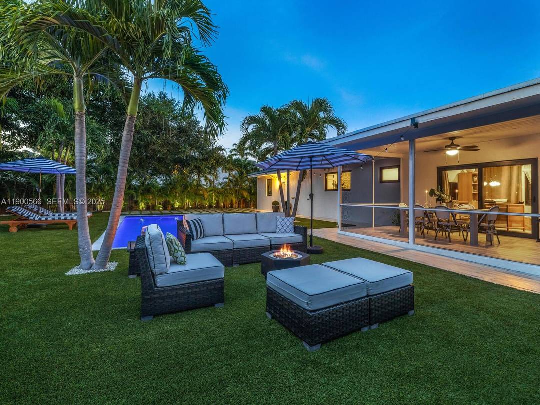 Tucked away behind a stately privacy hedge is Biscayne Park s best kept secret a just renovated midcentury pool home retreat, dripping in high end, luxe modern design.