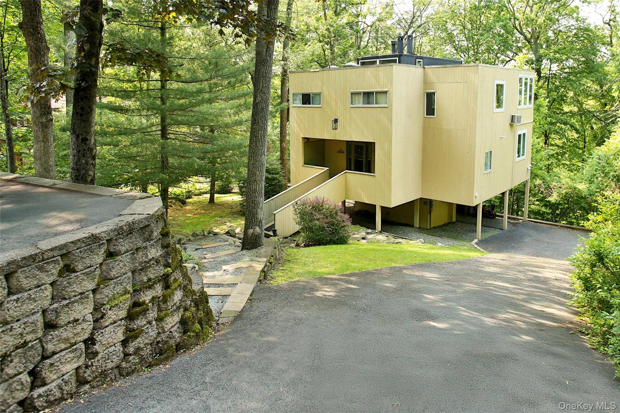Rare Mid Century Modern Gem in Tuxedo, NY Just 1 Hour from NYC Step back in time with this beautifully preserved 1968 Mid Century home, offering 4 spacious bedrooms, 2.
