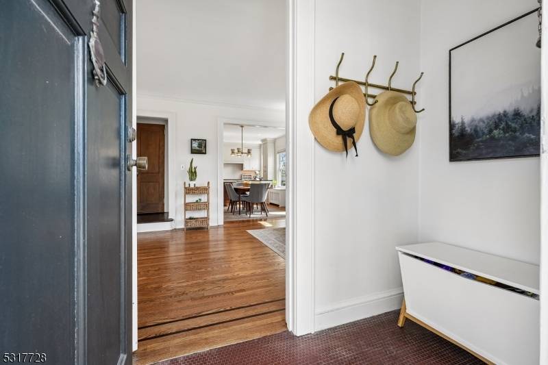 Welcome to this beautifully updated 4 bedroom, 2 full and 1 half bath Colonial in a prime location just blocks from NYC transportation, schools, parks, downtown, shopping, and dining.