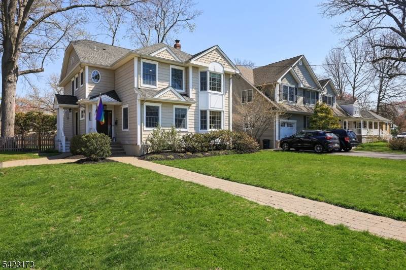 Move right into this beautifully maintained 4 bedroom, 2 full bath Colonial, perfectly situated on a tree lined street in one of Westfield's most charming neighborhoods.