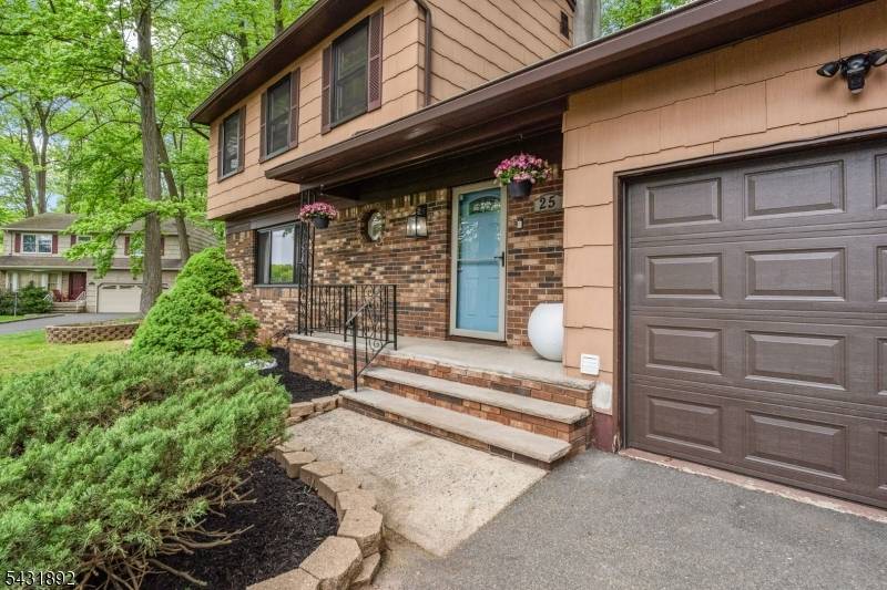 Welcome to this beautifully maintained home nestled in the heart of a quiet cul de sac in Clark, where comfort, style, and functionality come together seamlessly.