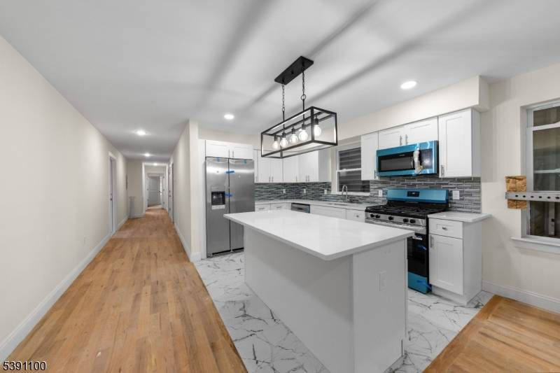 Introducing a rare opportunity to own a beautifully crafted, new construction two family home, offering exceptional space, style, and versatility.