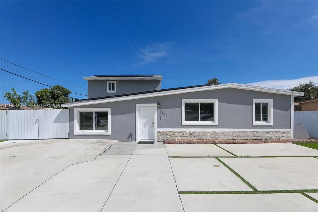 The house has 5 bedrooms and 3 baths along with an attached efficiency that has 1 bedroom and 1 bath making it a total of 6 bedroom and 4 bath.