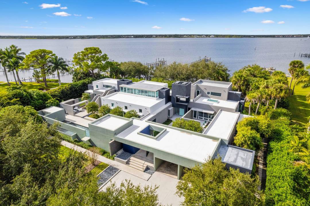 Spanning more than 200 feet of protected shoreline, this rare double riverfront estate offers an exceptional balance of privacy, scale, and uninterrupted St.