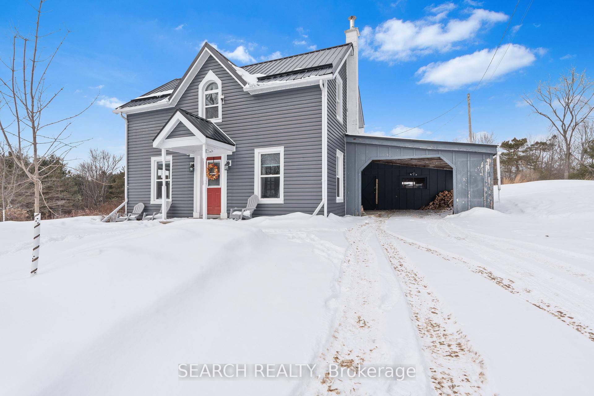 CHARMING HOME ON OVER 3 ACRES WITH A BARN !