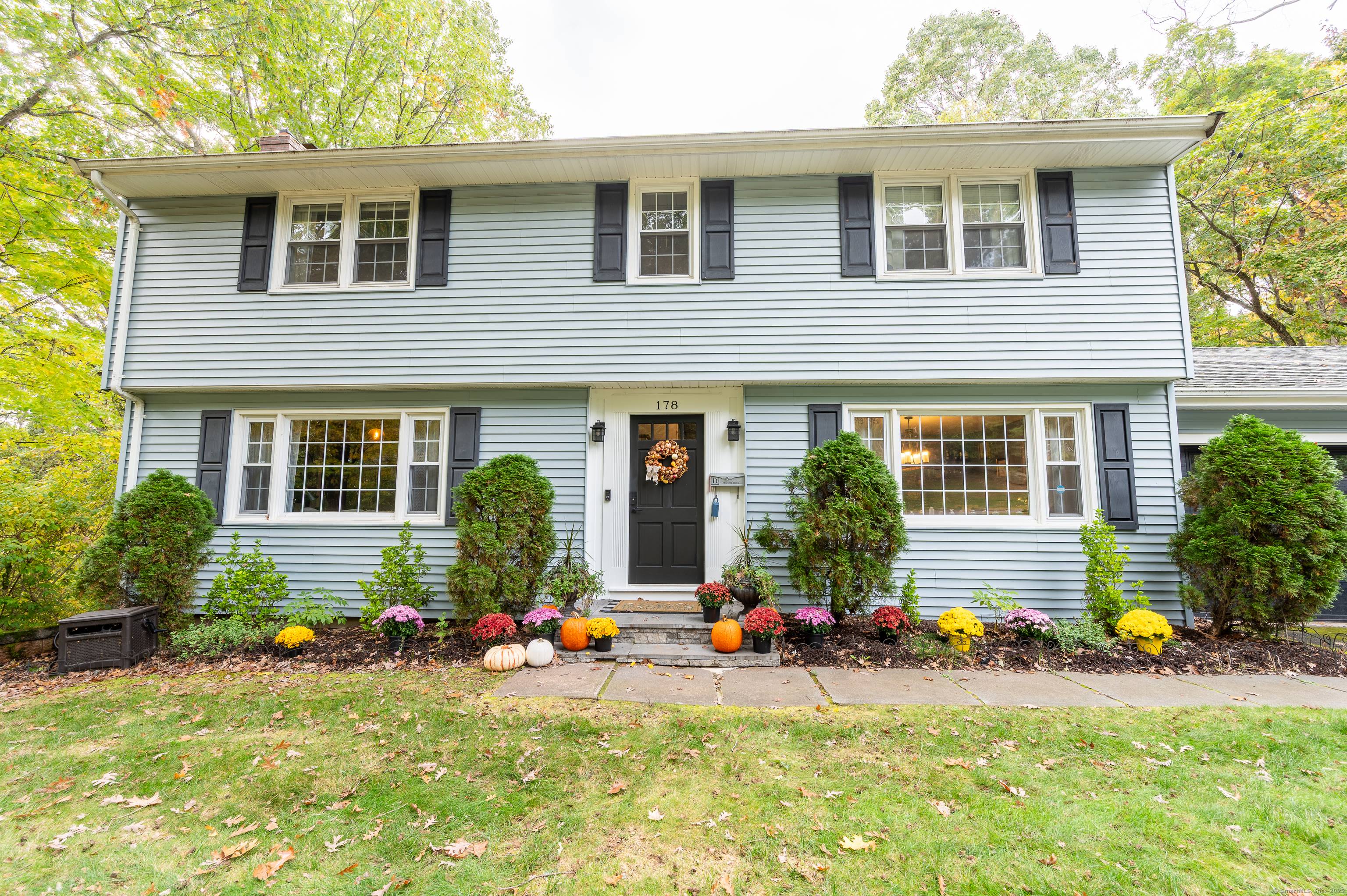 Attractive 4 bedroom colonial in residential setting within walking distance to the elementary and middle schools.