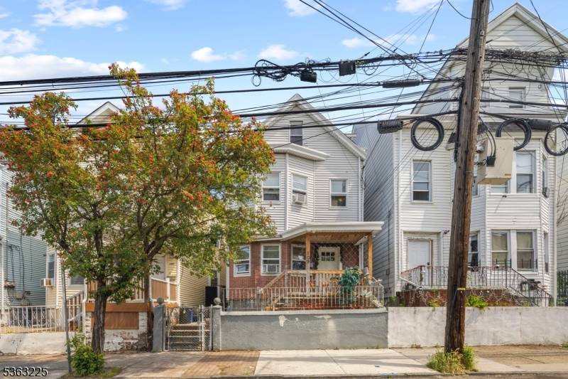 Welcome home to your income producing 2 family with bonus unit.
