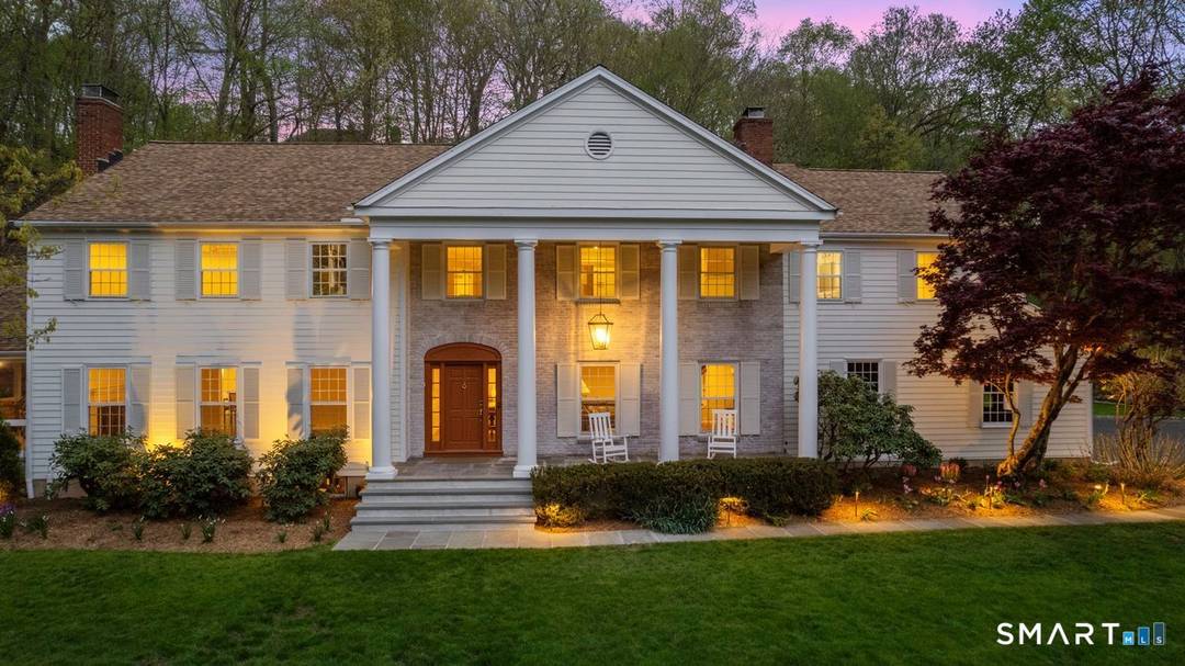 Privately set at the end of a long drive and elevated to capture tranquil reservoir views, this more than 5, 500 square foot Colonial offers a rare sense of serenity ...