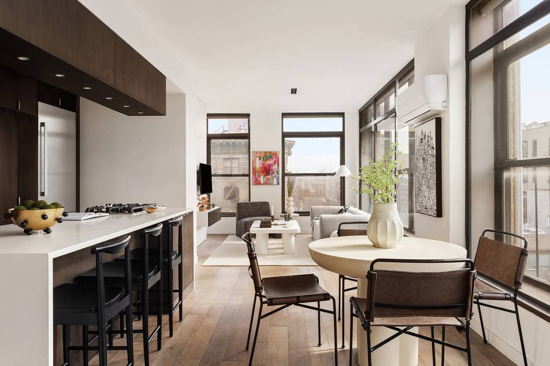 Welcome home to this massive corner, top floor one bedroom, flooded with natural light in a boutique elevator building in the heart of the East Village.