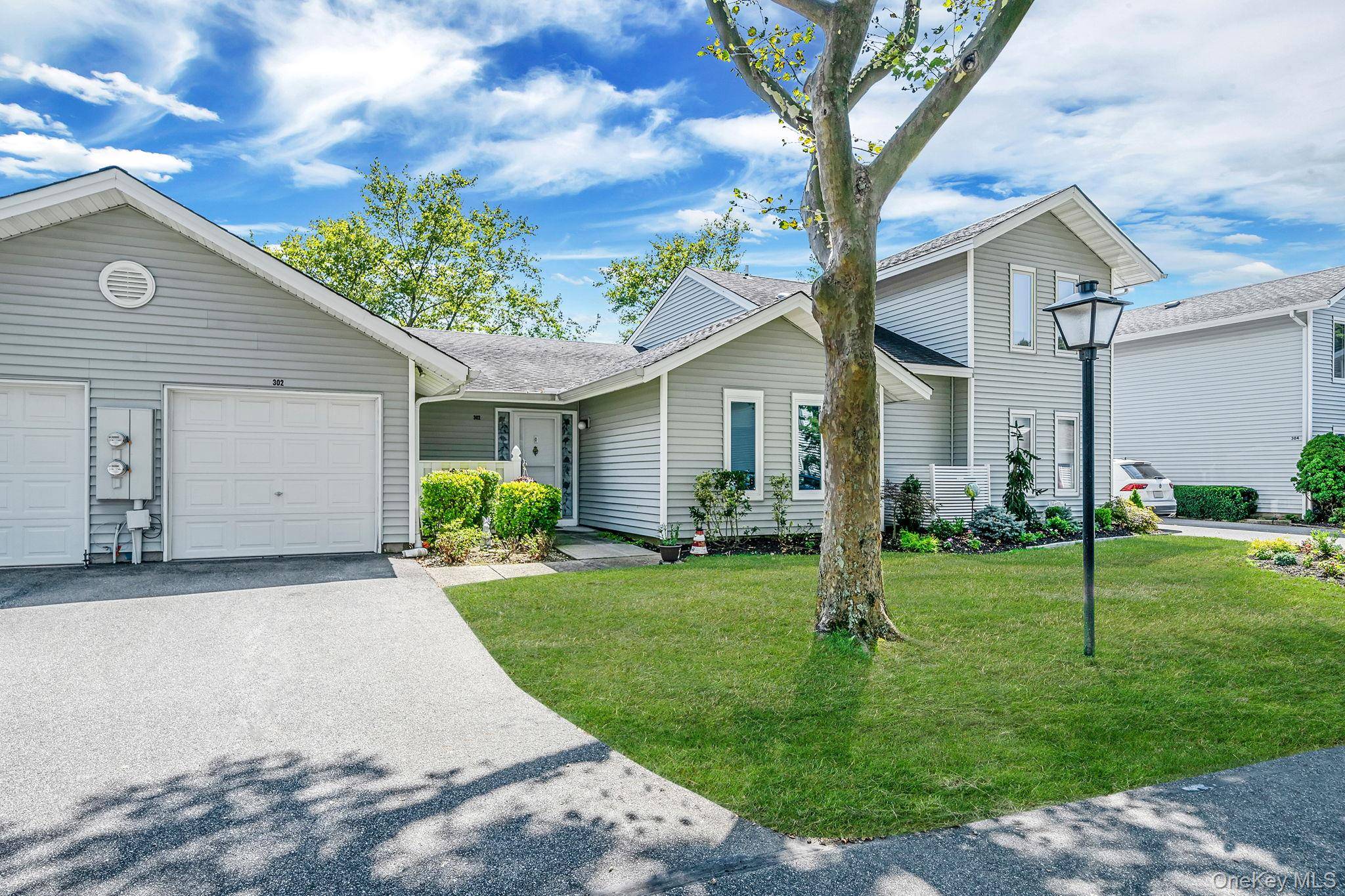 Beautifully updated 2 bed, 2 bath ranch style condo in a highly sought after 55 community.