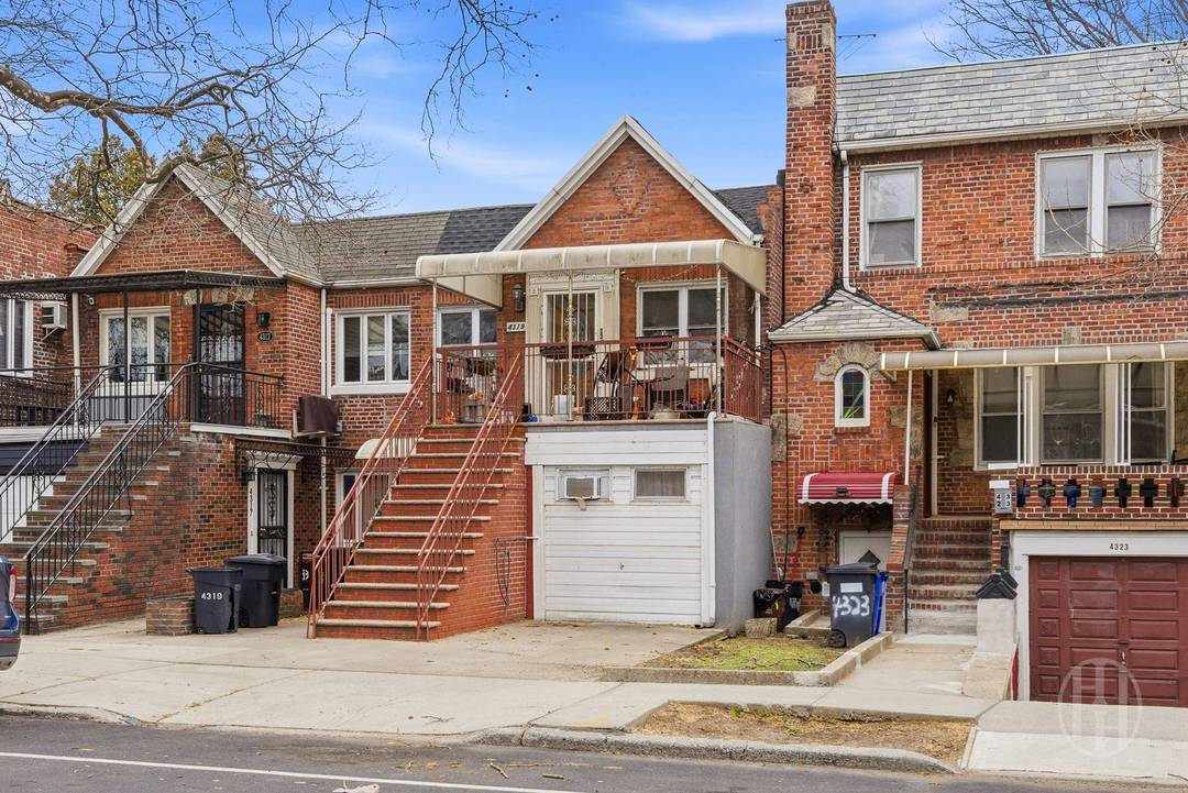 Legal 2 Family Brick Home with Garage, Driveway, Finished Cellar, and Strong Income Potential Well maintained legal 2 family brick property situated on a 20 x 100 lot with a ...