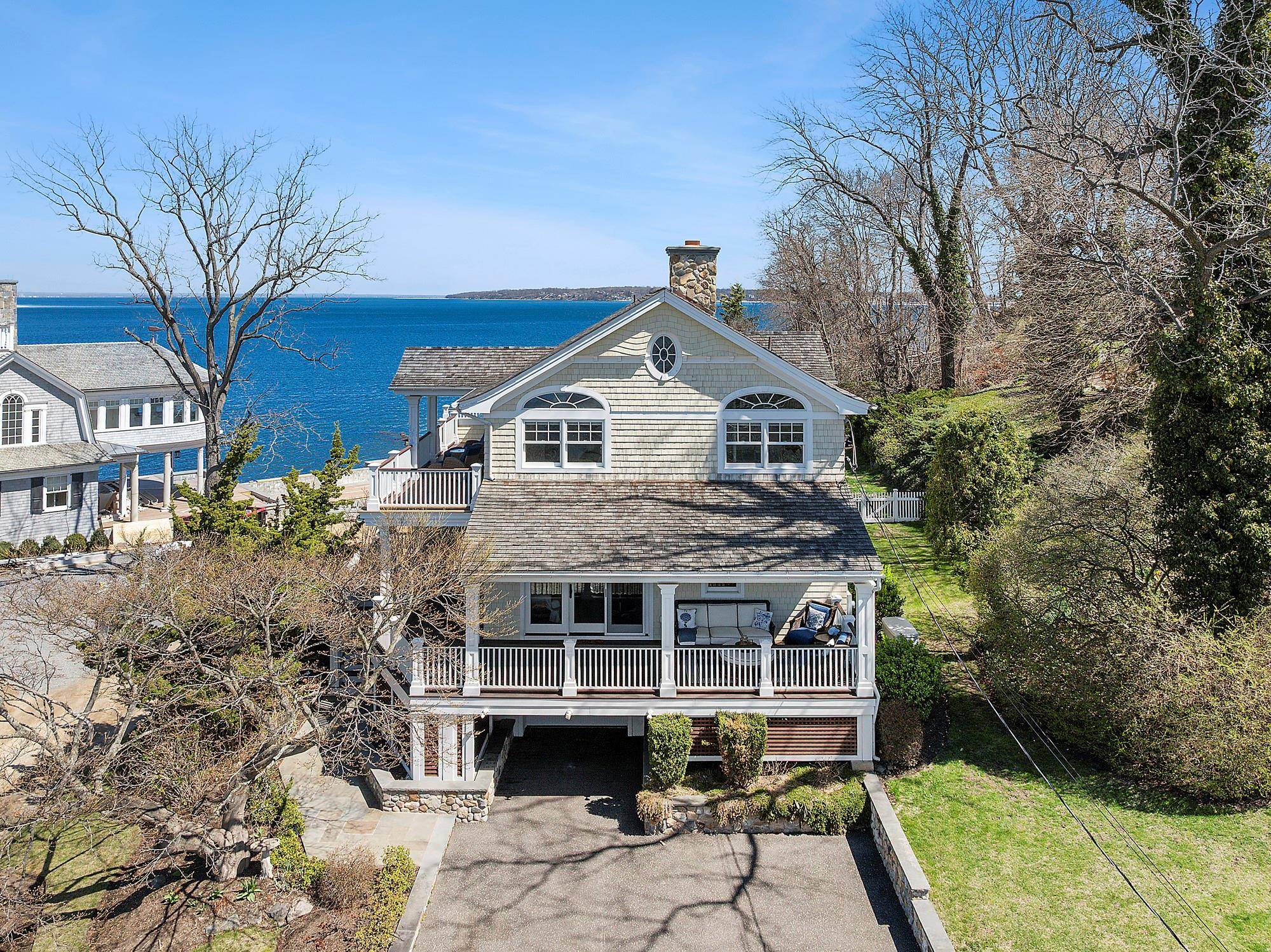 This custom renovated Colonial Beach house in the sought after Wincoma Beach Association fees apply offers stunning sunrise and sunset views from multiple mahogany decks.