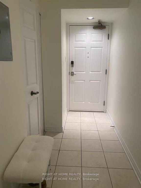 Experience modern living in this top floor 1 bedroom den, 1 bath apartment in the prestigious Crystelle building.