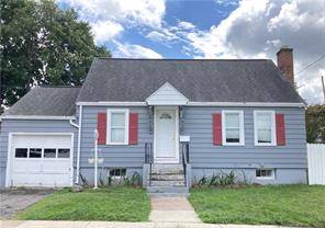 Charming and cozy 3 bedroom Cape with 2 full bathrooms, updated kitchen and bathrooms, open layout, Central Air, spacious living room with fireplace, dining room, and 1 car garage.