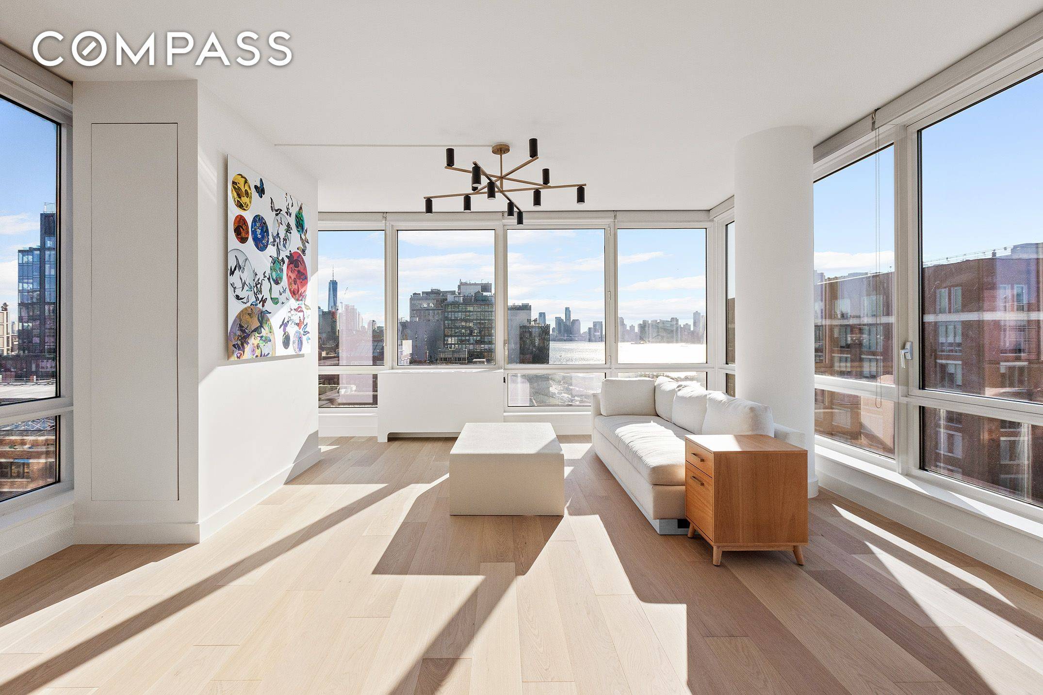 Perched high above the rooftops of West Chelsea, Residence 1709 at The Caledonia offers a rare blend of dramatic water views, radiant light, and impeccable modern design.