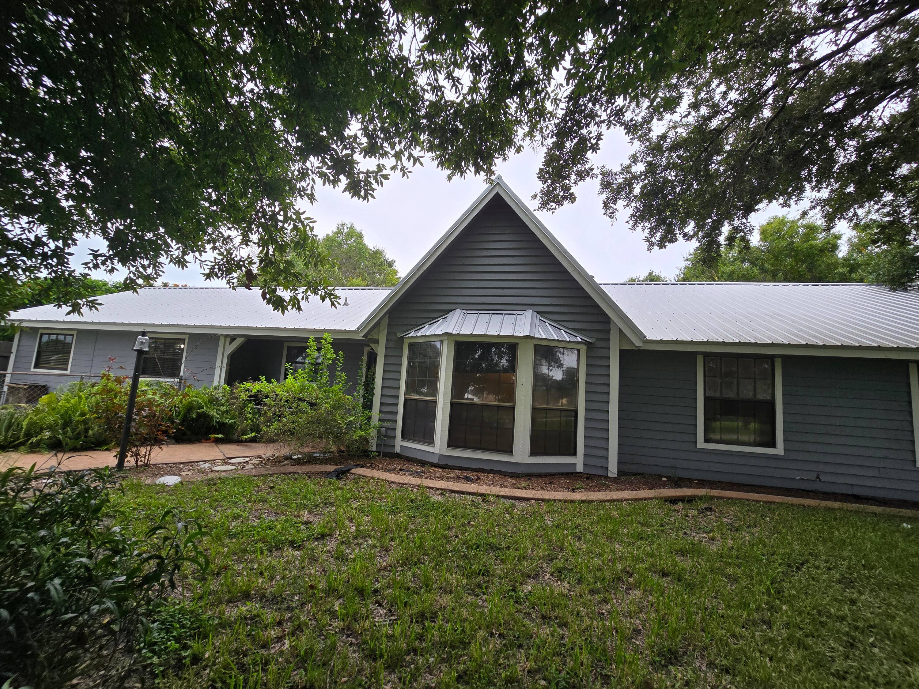 Nestled in the cozy neighborhood of Lazy 7, this unique home offers the perfect blend of tranquility and convenience.
