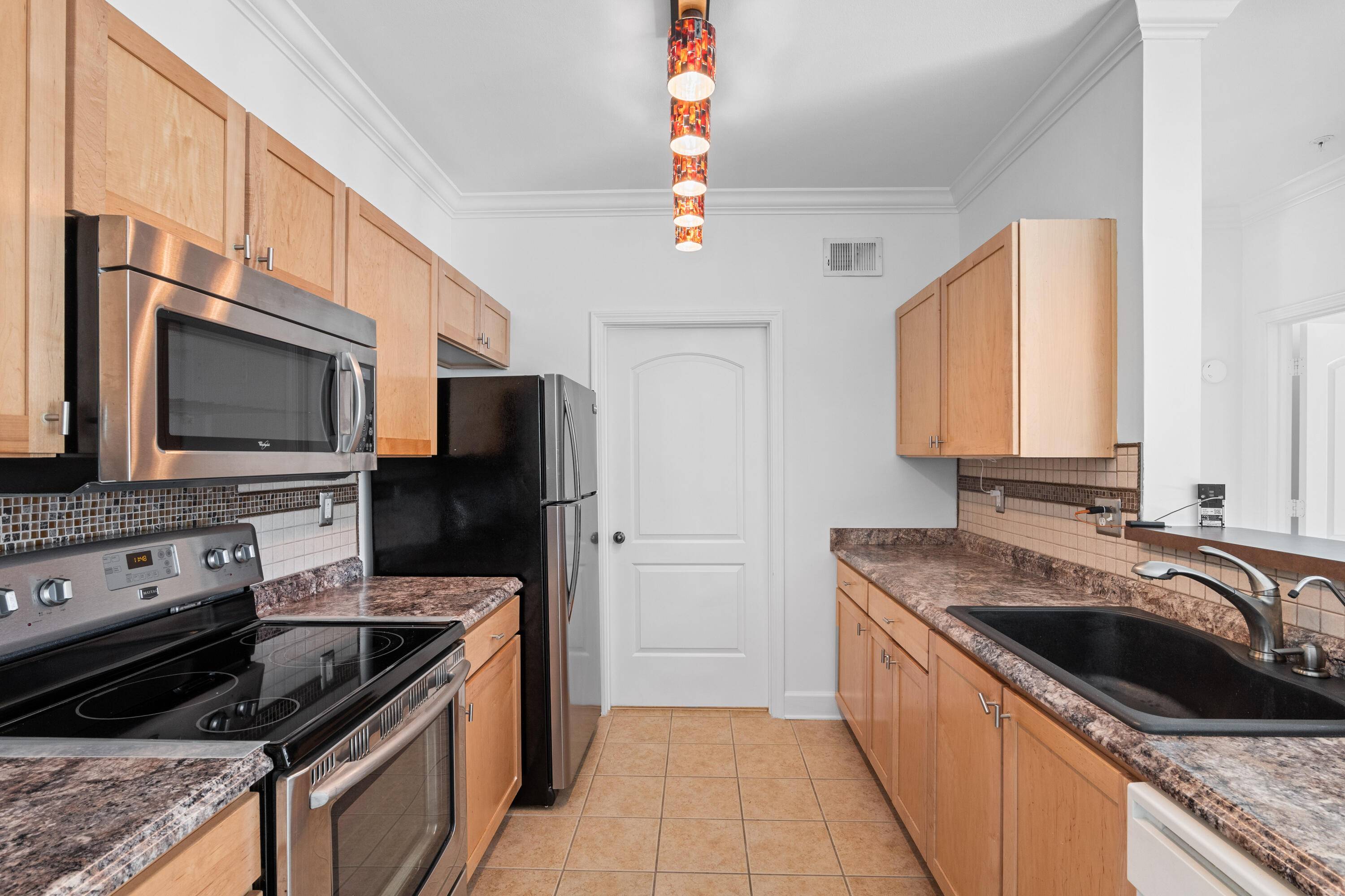 LOWEST PRICED 2 bedroom, 2 bathroom condo with GARAGE in Three Fountains of Viera !