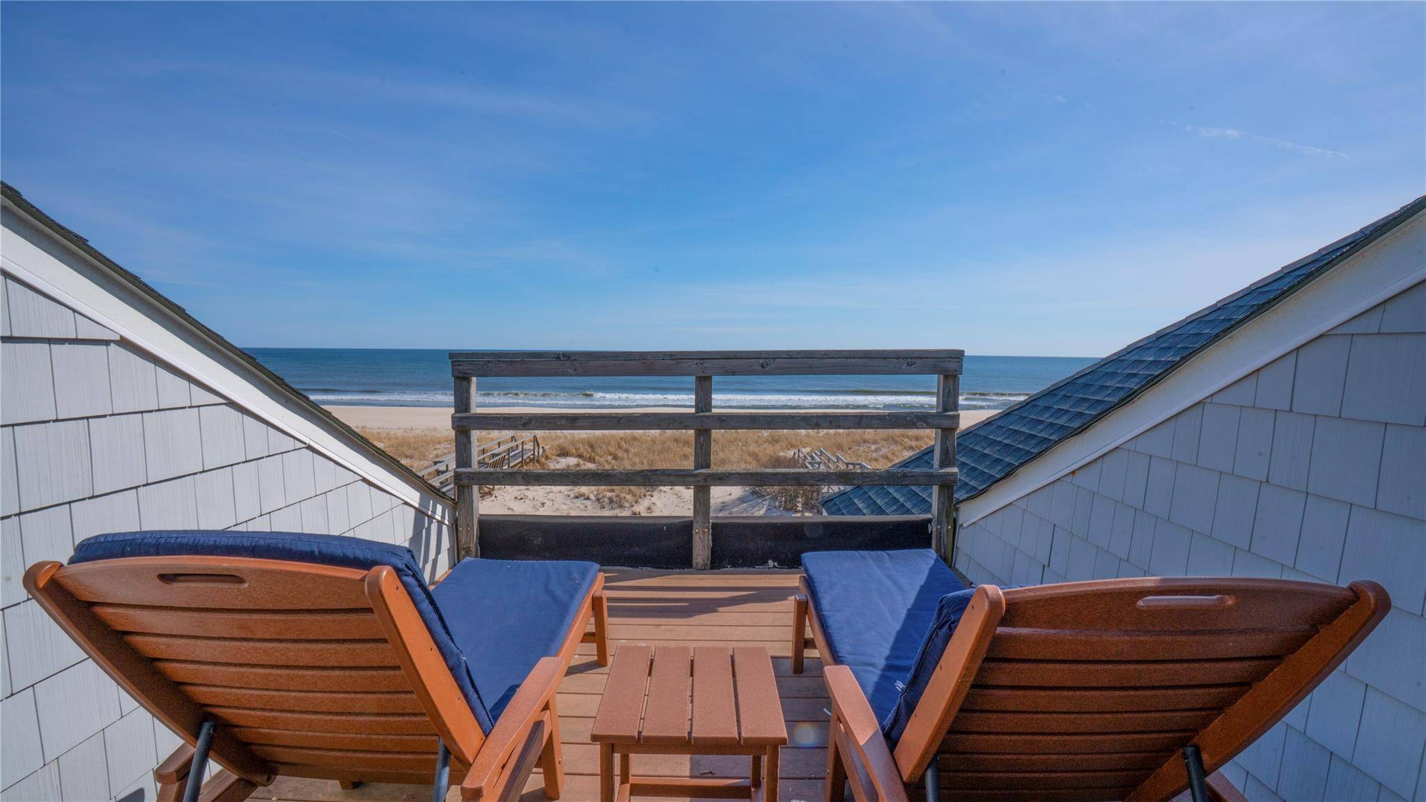 Ocean Escape Your Private Oasis and View of the Sea Step onto your private boardwalk, where the scent of salt air fills your lungs, and the soft whisper of the ...