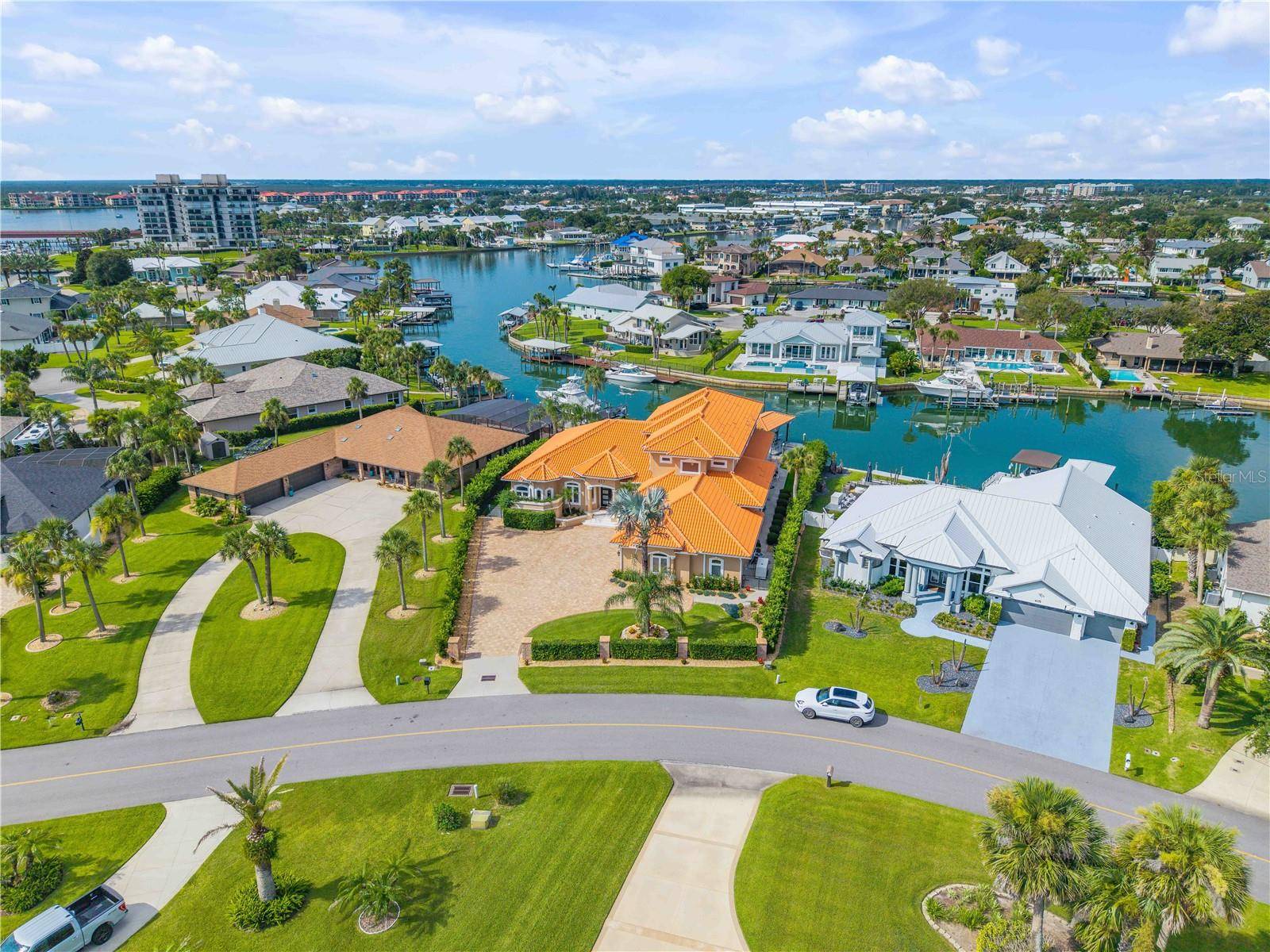 Introducing one of New Smyrna Beach's finest turnkey waterfront estates.