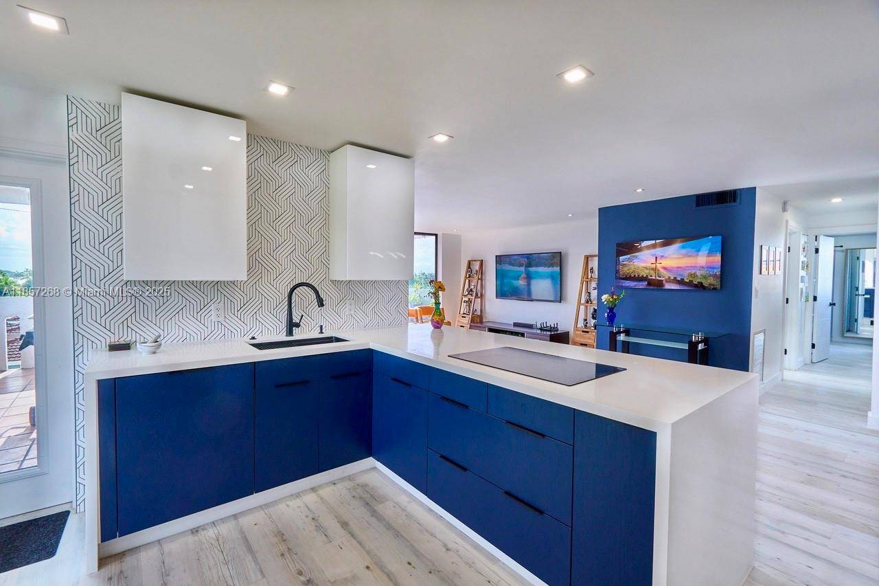 Motivated Seller ! Welcome to this Luxurious Completely Remodeled Art Deco Home in the Exclusive Community of Eastern Shores ; surrounded by Multimillion dollar homes !