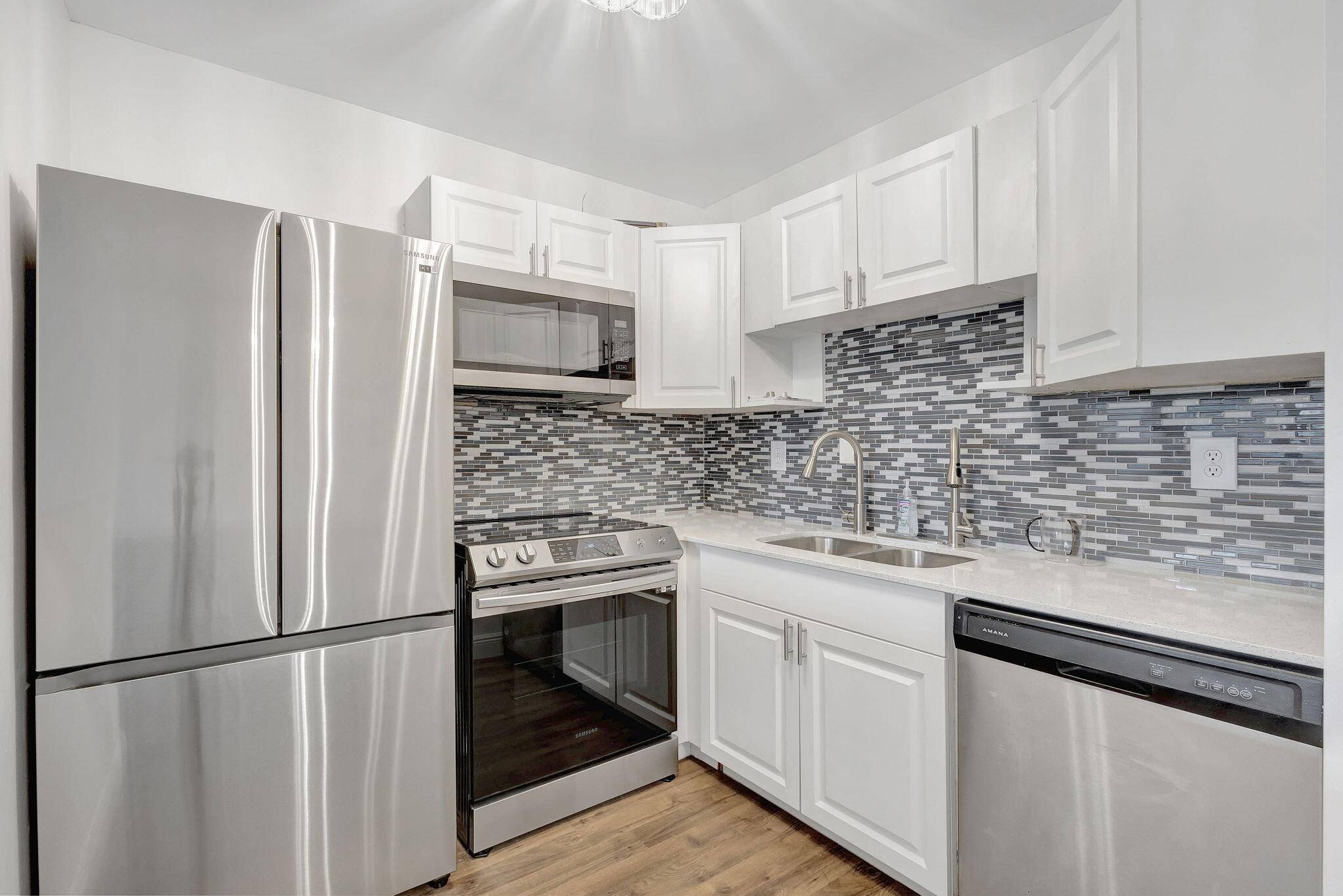 WOW ! BRING OFFERS, MOTIVATED SELLER DON'T MISS OUT MOVE RIGHT INTO THIS STUNNING 1 BED 1 BATH TOTALLY REMODELED GROUND FLOOR CONDO.