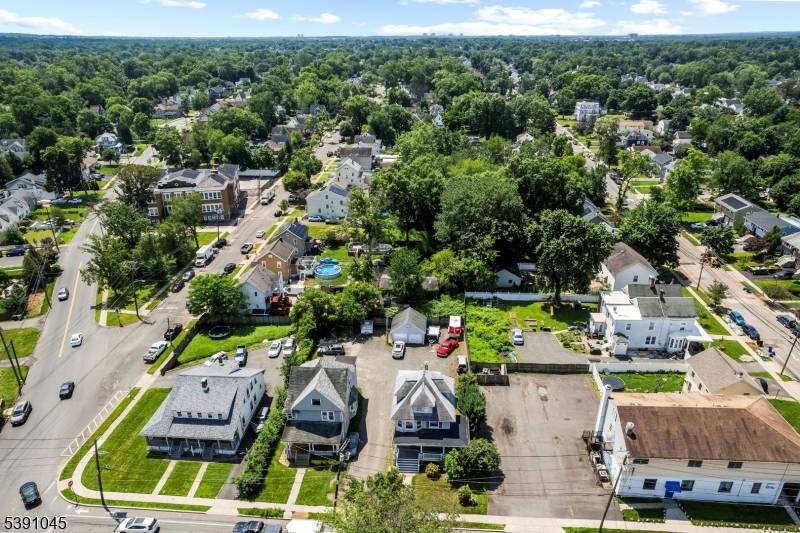 This unique multi family home is located in the heart of Dunellen Just 1 block from Downtown Train Station with direct access to NYC !